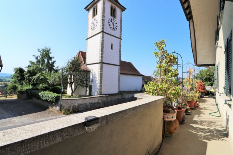 Immoschwab-ag-Mehrfamilienhaus-Siselen 12 Wohnung EG - Balkon